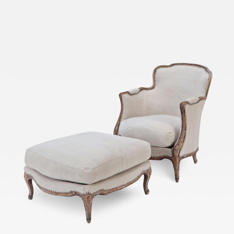 A French Louis XV style armchair and ottoman Circa 1910 