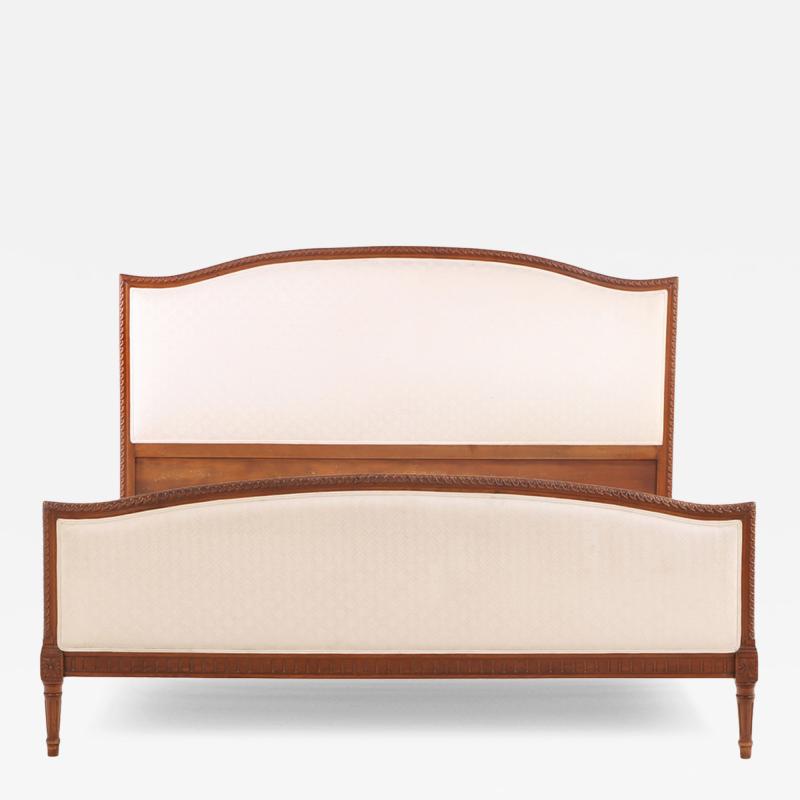 A French Louis XVI style Walnut Full Size Bed C 1930 