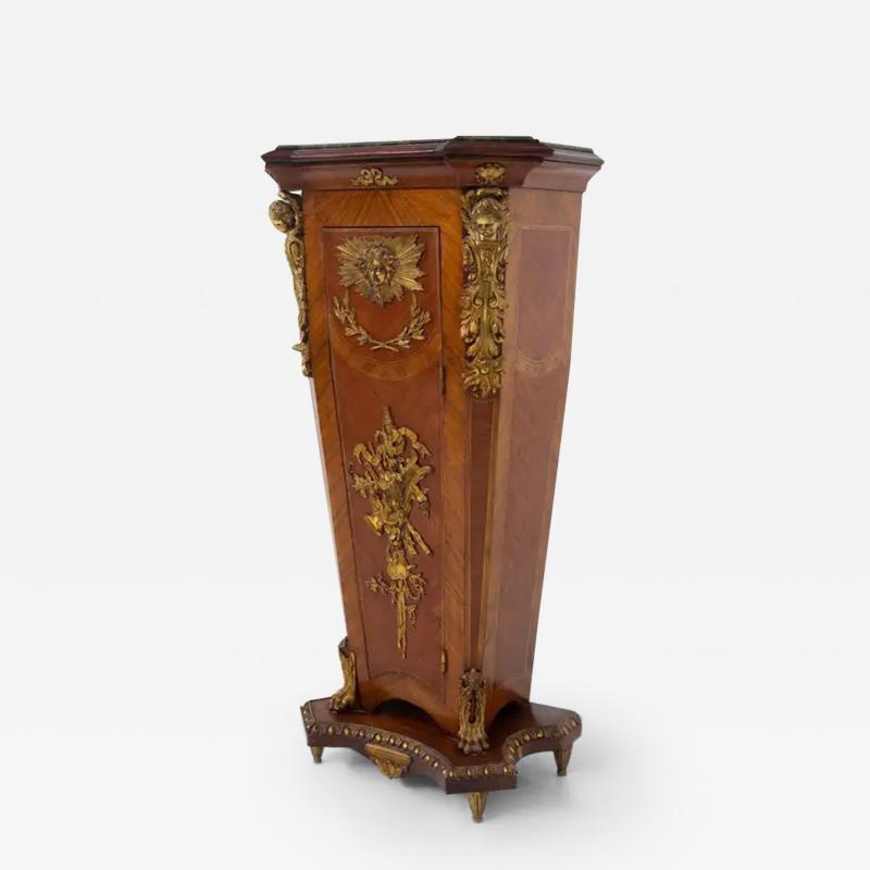 A French Louis XVI style gilt bronze mounted wooden pedestal