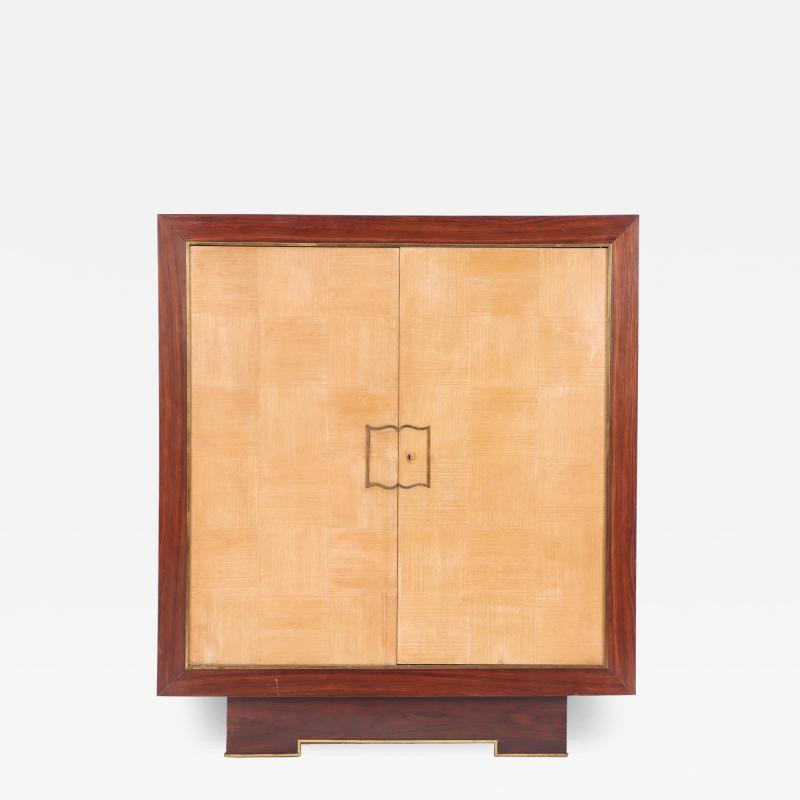 A French Modernist two door parquetry cabinet C 1960
