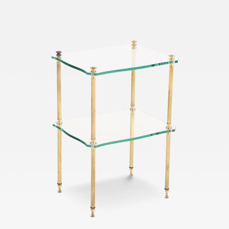 A French brass and glass tiered end table C 1960 