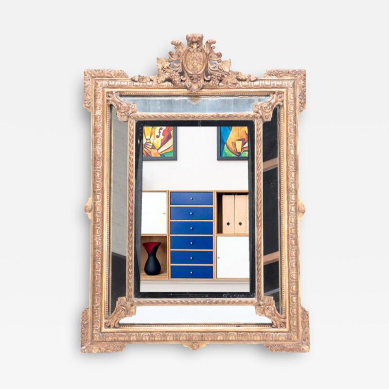 A French gilt wood and gesso mirror with mirrored border Circa 1900 
