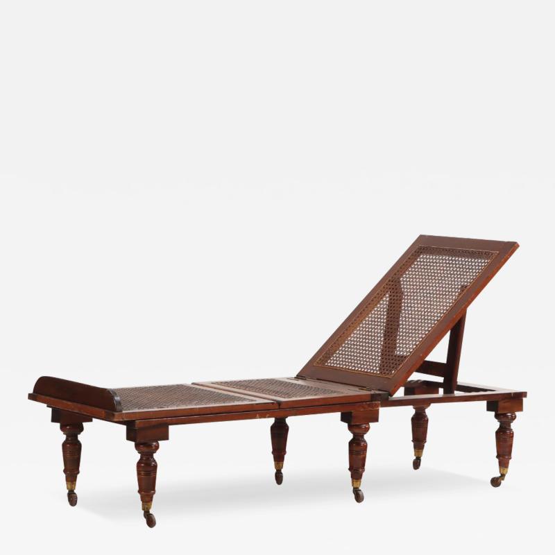 A French mahogany and cane chaise lounge campaign bed 19th century 