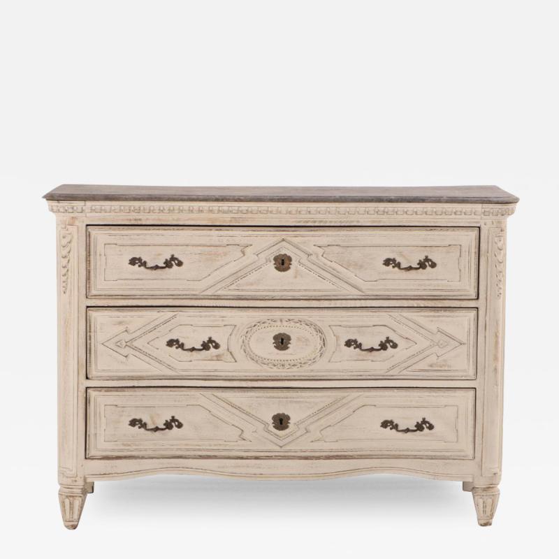 A French painted and carved three drawer commode 18th century 