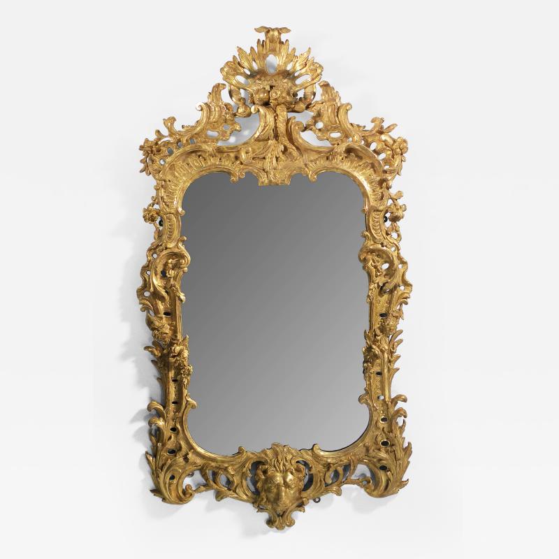 A GEORGE II STYLE GILTWOOD MIRROR