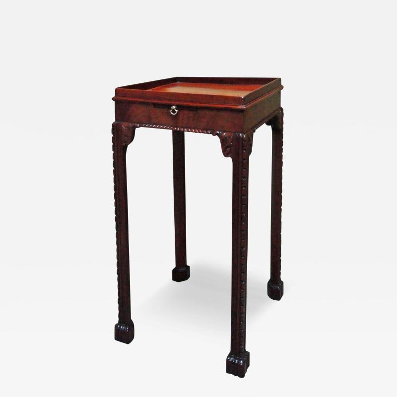 A GEORGE III MAHOGANY KETTLE STAND