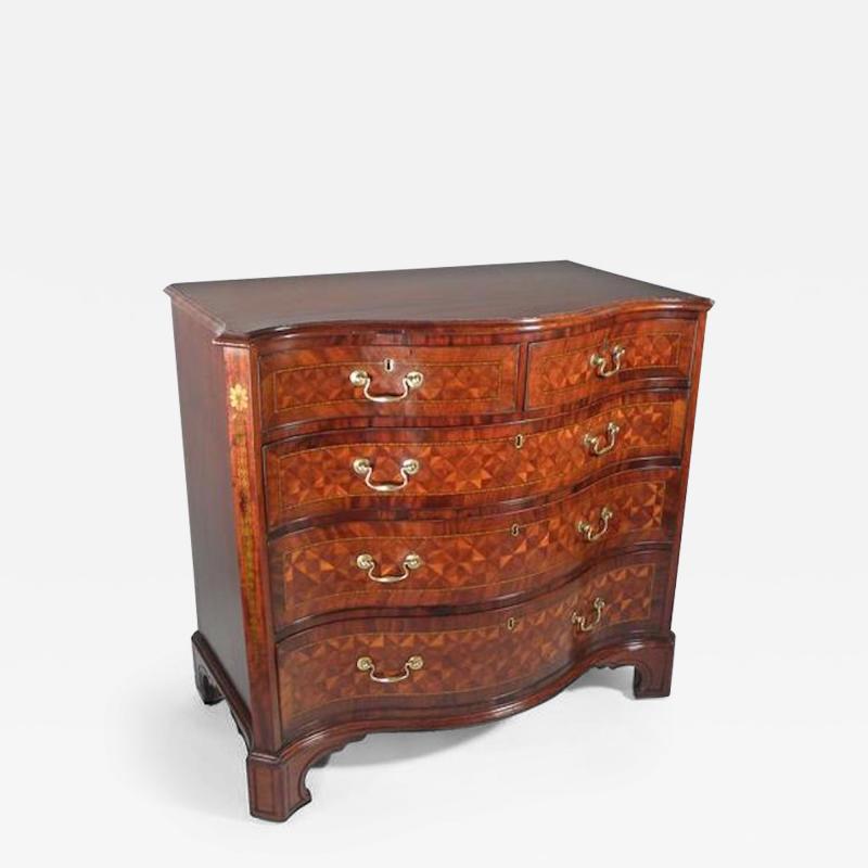 A GEORGE III STYLE MAHOGANY AND MARQUETRY CHEST OF DRAWERS