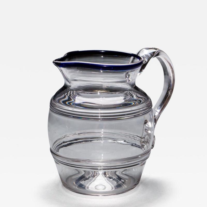 A GEORGIAN BLUE RIM WATER JUG