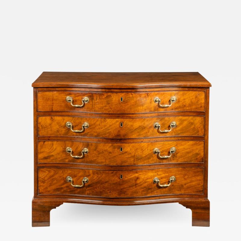 A George III Chippendale period mahogany serpentine chest