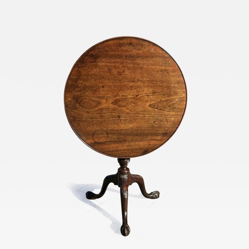 A George III period Mahogany tripod table 