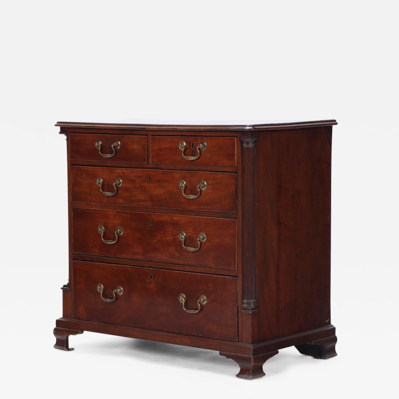 A Georgian mahogany chest of drawers with brass pulls 19th C