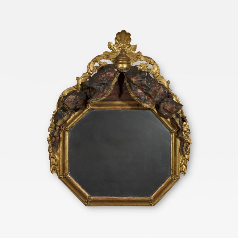 A Giltwood Octagonal Mirror With Floral Painted Canopy Crest