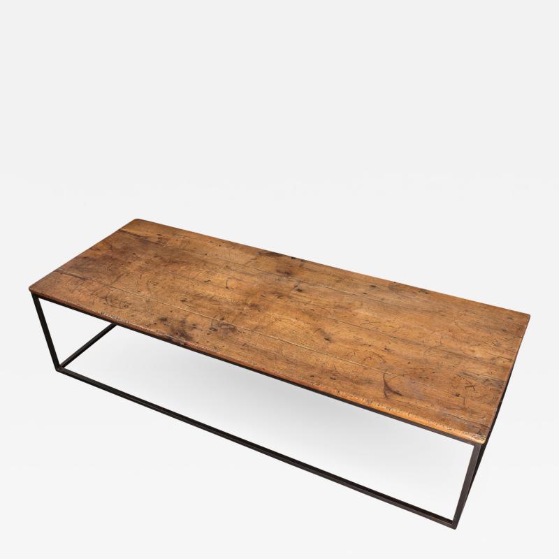 A Good Cherry and Metal Mounted Coffee Table