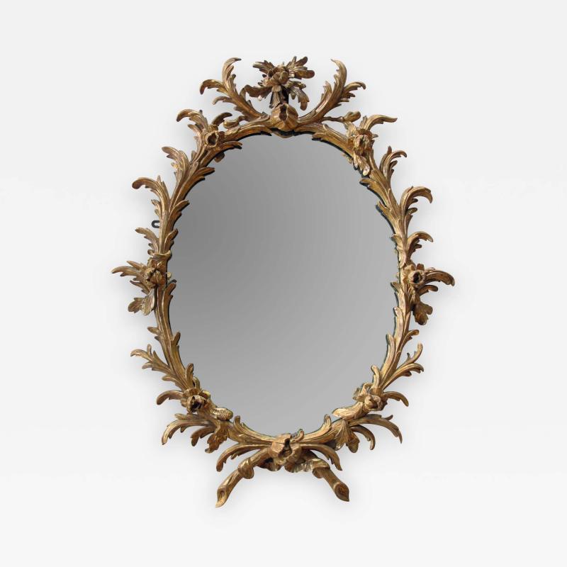 A Good Quality George II Rococo Gilt Wood Oval Foliate Carved Mirror