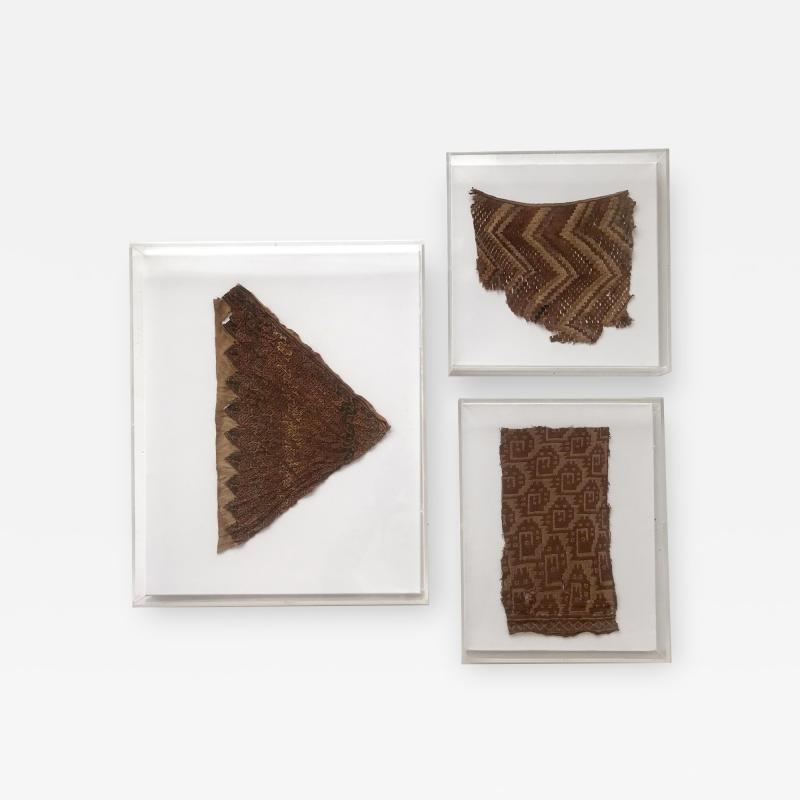 A Group of Three Framed Pre Columbian Textile Fragments