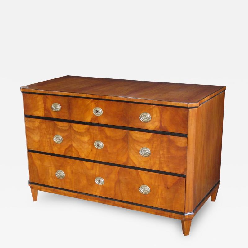 A Handsome Austrian Biedermeier Cherry Wood Chest with Ebonized Highlights