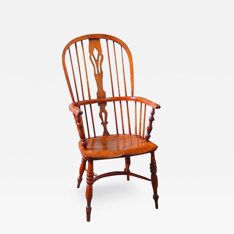 A Harlequin Set of Four Fine 18th Century English Elmwood Windsor Chairs