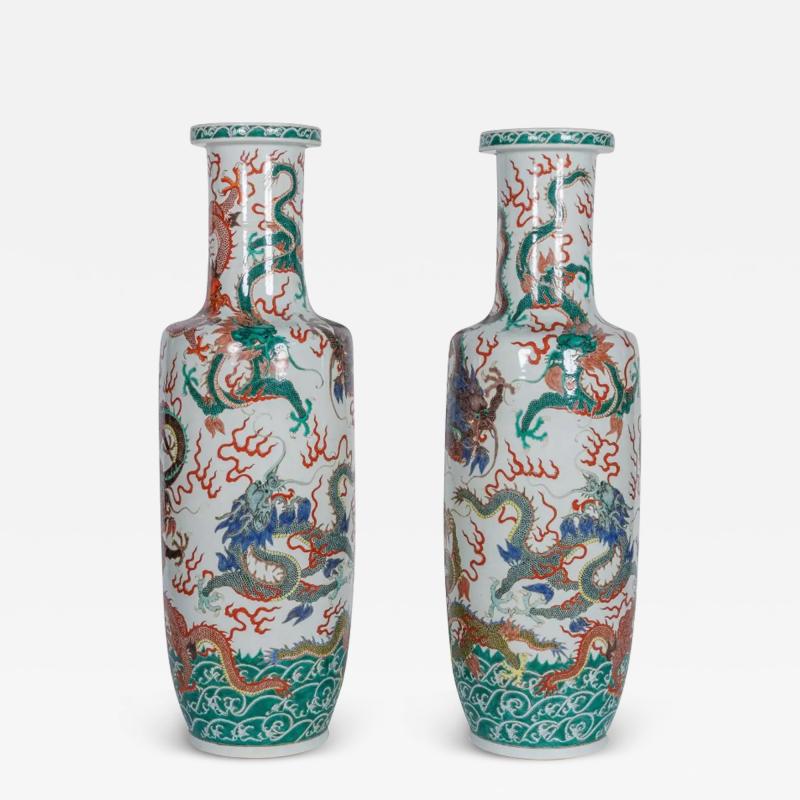 A Highly Rare Pair of Monumental Qing Dynasty Rouleau Porcelain Dragon Vases