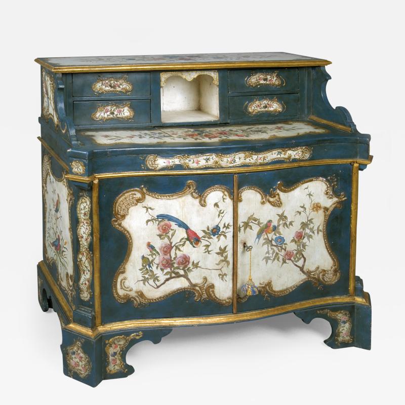 A Lacquered and Gilded Wood Cabinet and Desk