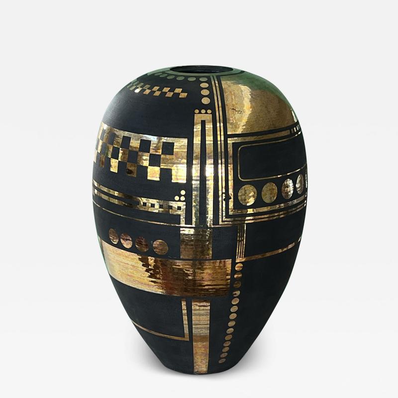 A Large Art Deco Style Black Glazed Ovoid Vase with Gilt Geometric Decoration