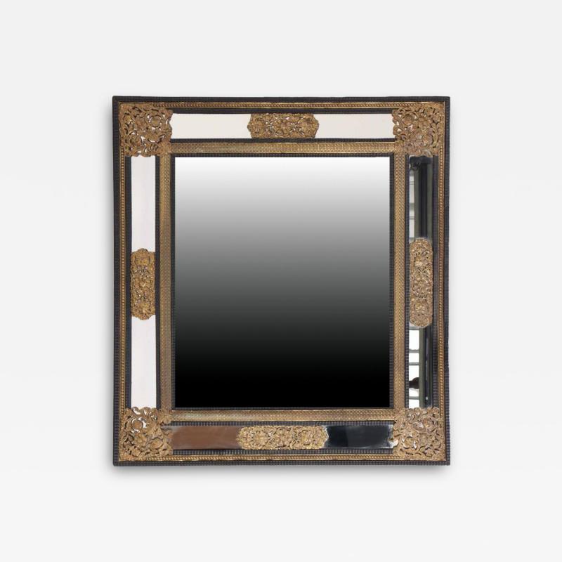 A Large Dutch ebonized wood and brass mirror C 1890 