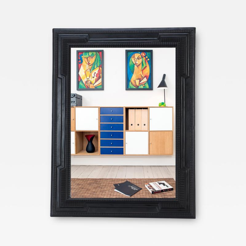 A Large Dutch style ebonIzed frame with ripple carving Circa 1940 
