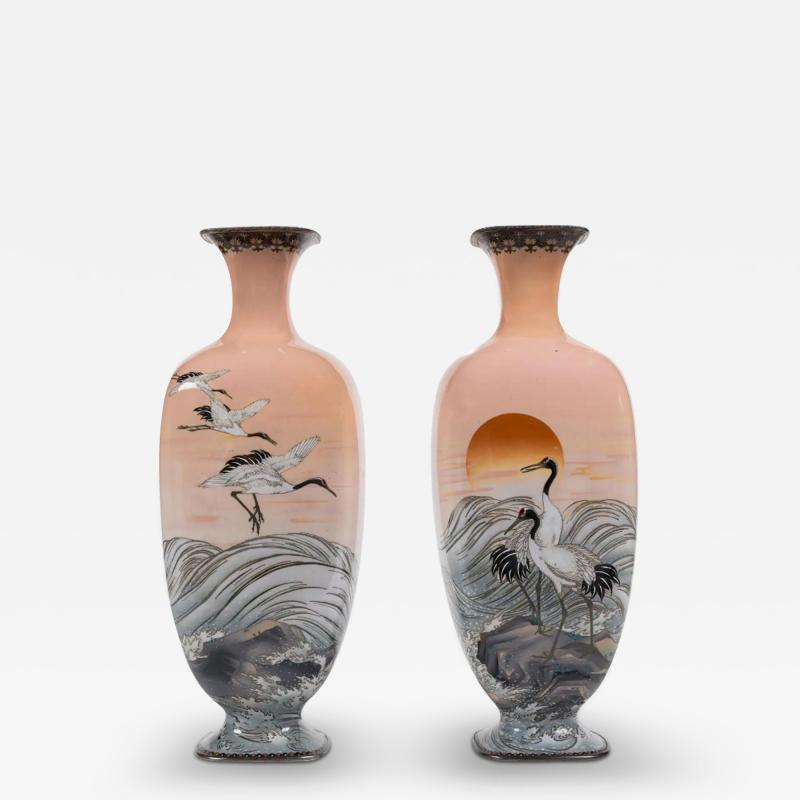 A Large Pair of Japanese Cloisonne Pink Ground Vases Featuring Sunset and Cranes