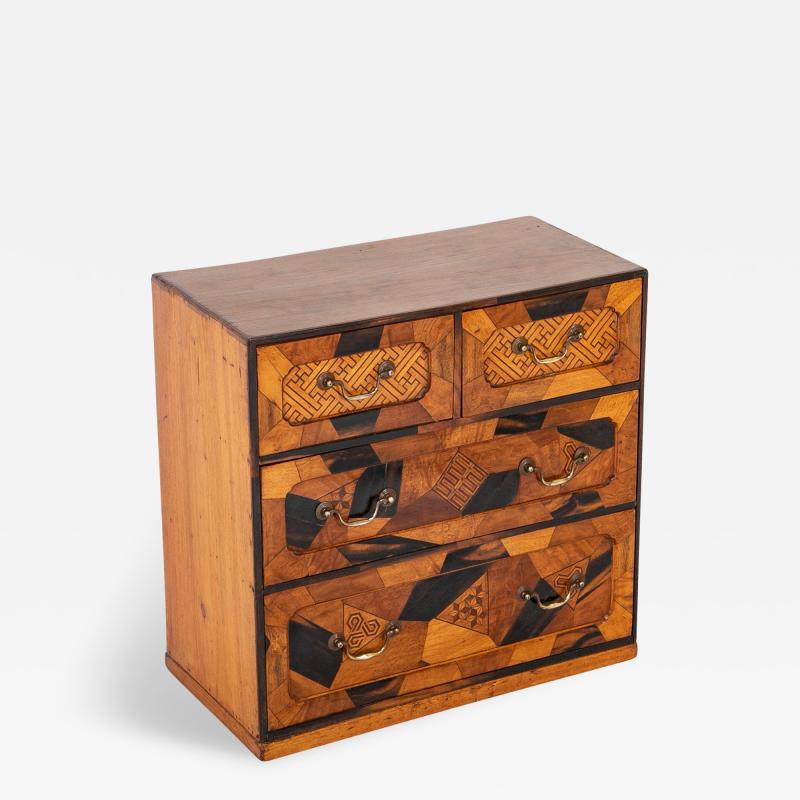 A Late 19th Century Japanese Inlaid Four Drawer Tansu