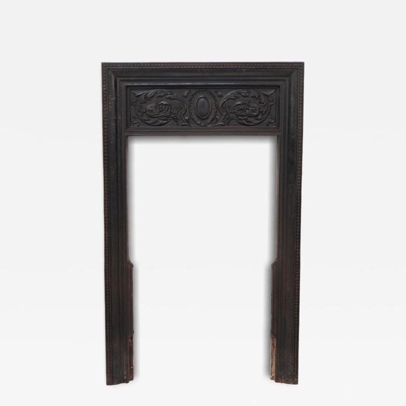 A Late Victorian Fireplace with Stylized Floral Details to the Top