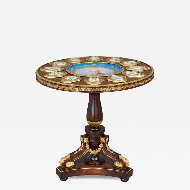 A M E Fournier Neoclassical style porcelain and gilt bronze mounted circular table by Fournier