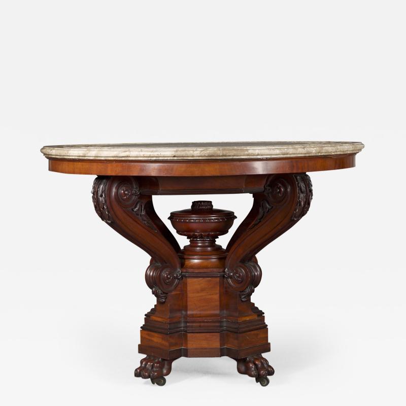 A Mahogany Neoclassical Center Table With Concentric Turned Marble Molded Top