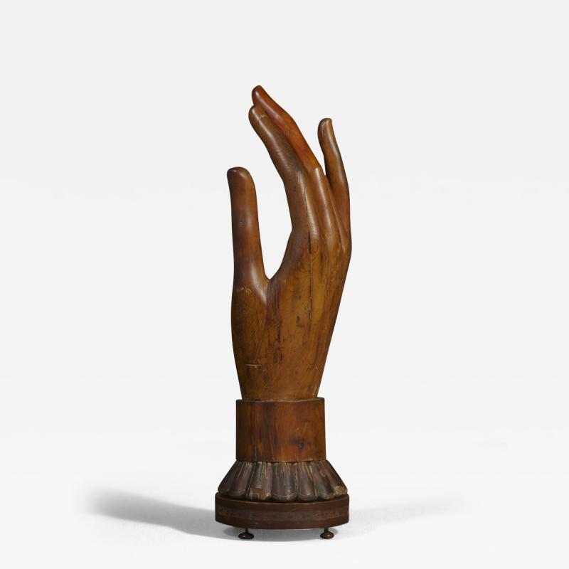 A Massive and Elegantly carved Wooden sculpture of a Lady s gloved hand