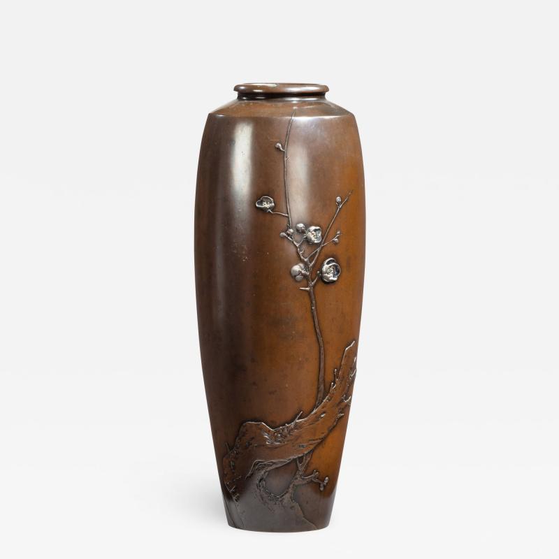 A Meiji period bronze vase by Yoshiharu