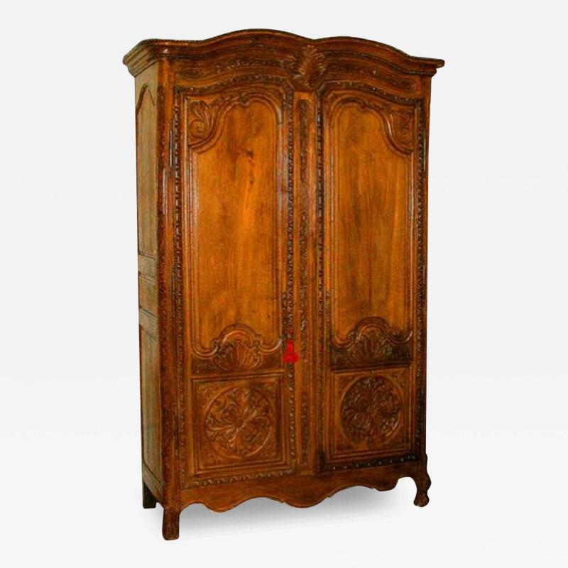 A Mid 18th Century French Louis XV Bleached Ash Armoire