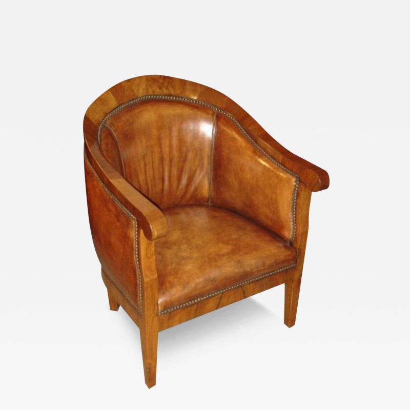 A Mid 19th century Walnut German Biedermeier Tub Chair