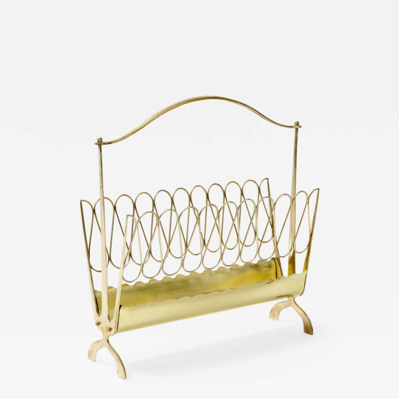 A Mid Century Italian Brass Magazine Rack in the Manner of Borsani