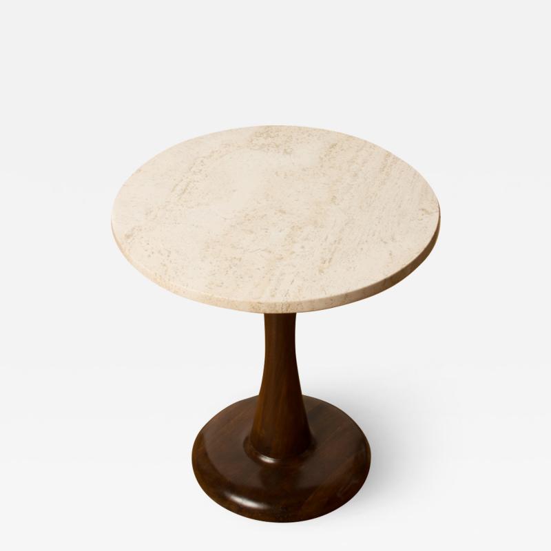 A Mid Century Modern round occasional table with marble top and walnut base