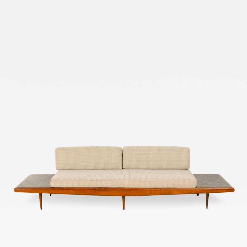 A Mid Century Modern sofa in the manner of Adrian Pearsall 