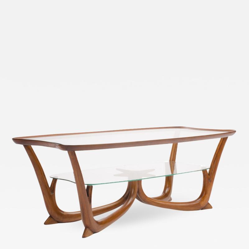 A Modern Italian mahogany coffee table with glass top circa 1950