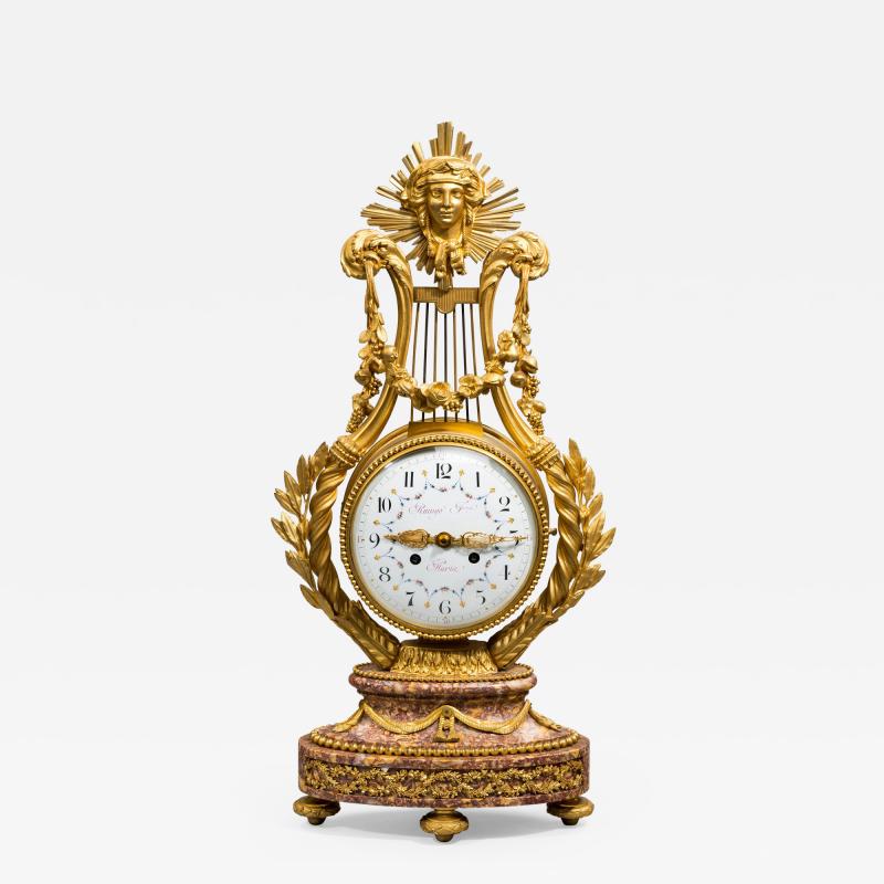 A Napoleon III Lyre clock with ormolu hand