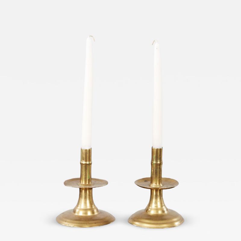 A Near Pair of 17th c English Brass Candlesticks