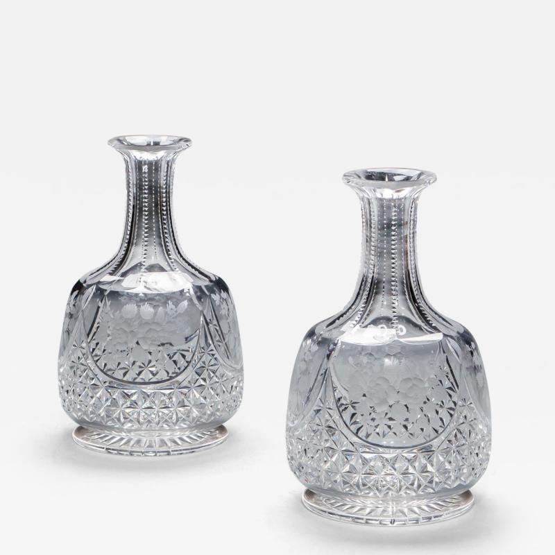 A PAIR OF CUT ENGRAVED WATER CARAFES
