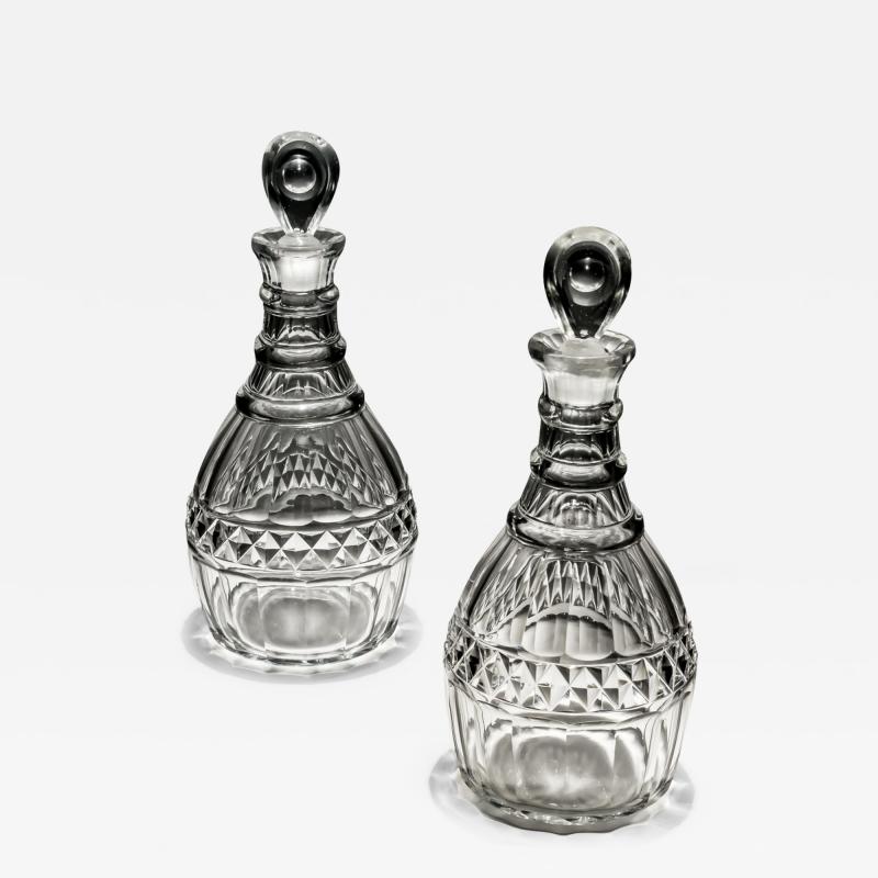 A PAIR OF CUT GEORGIAN DECANTERS