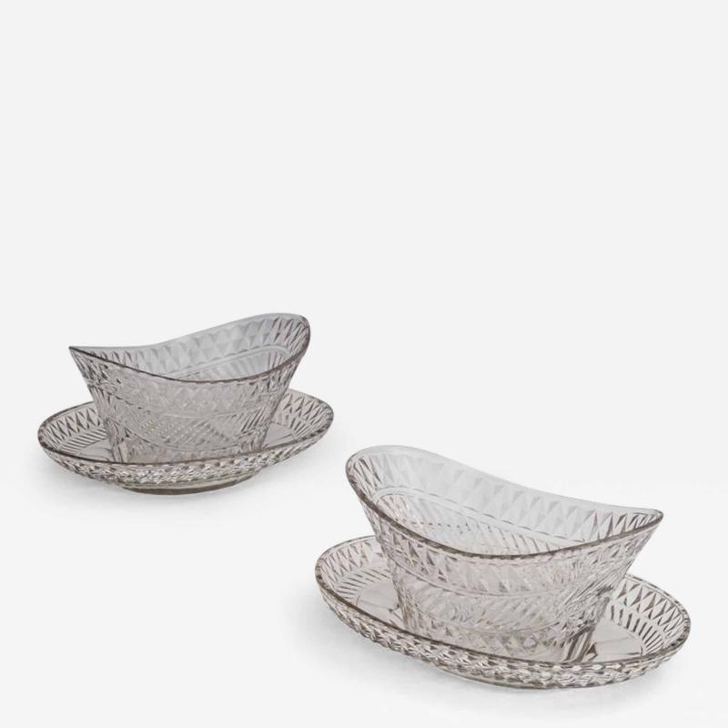 A PAIR OF DIAMOND MITRE CUT DISHES IN STANDS