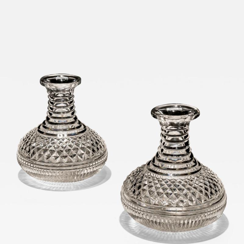 A PAIR OF DIAMOND STEP CUT CARAFES