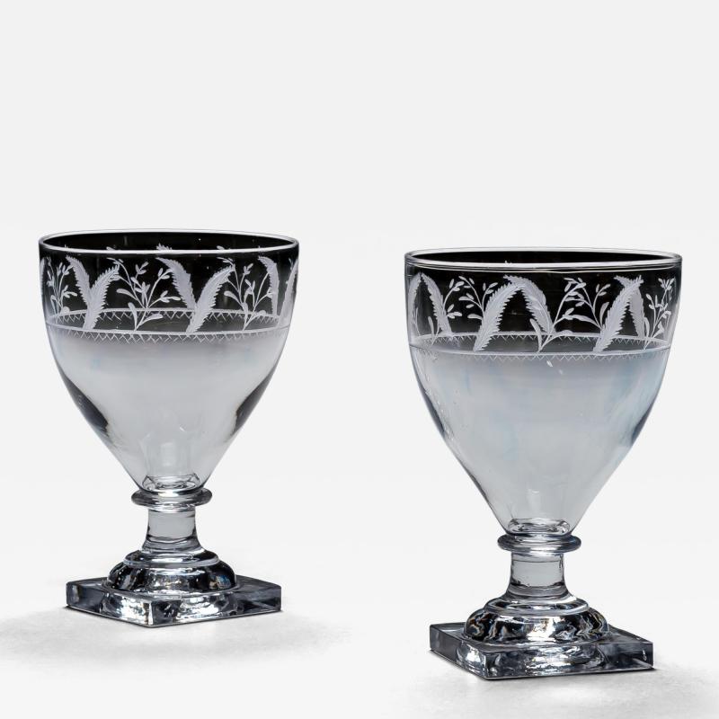 A PAIR OF ENGRAVED SQUARE BASE RUMMERS