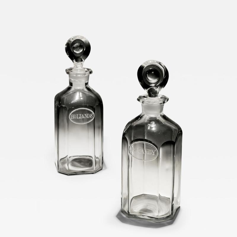 A PAIR OF ENGRAVED SQUARE SPIRIT BOTTLES