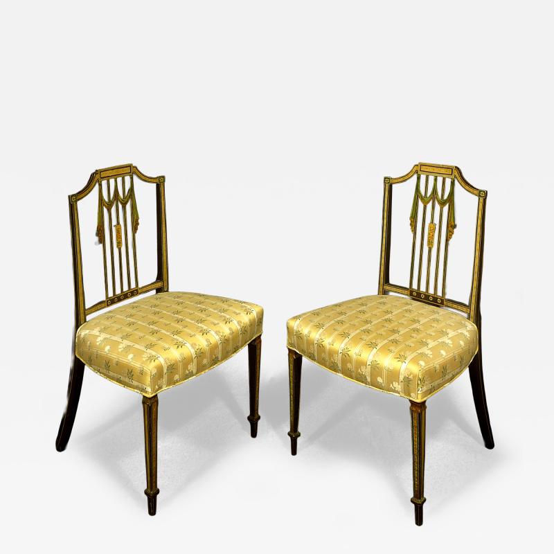 A PAIR OF GEORGE III BLACK PAINTED SIDE CHAIRS
