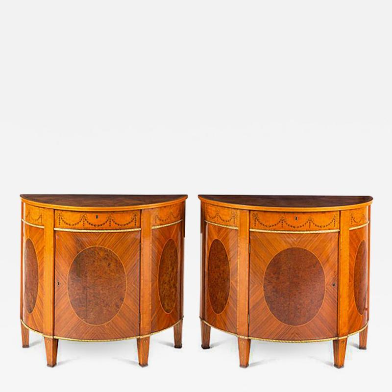 A PAIR OF GEORGE III GILT BRONZE MOUNTED COMMODES
