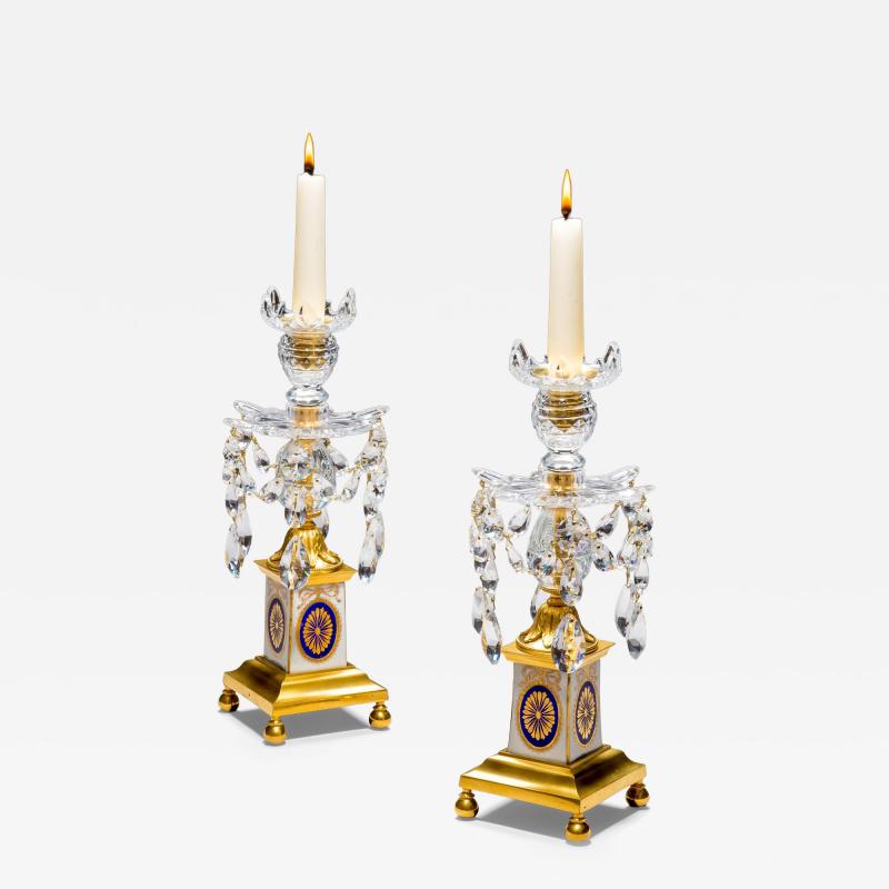 A PAIR OF GEORGE III ORMOLU MOUNTED PORCELAIN CUT GLASS CANDLESTICKS